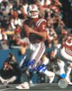 Steve Grogan signed New England Patriots 16X20 Photo (red jersey dropback)