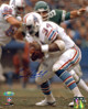 Earl Campbell signed Houston Oilers 8X10 Photo (white jersey)- Tri-Star Hologram