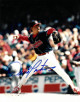 Dennis Martinez signed Cleveland Indians 8x10 Photo (navy jersey)