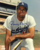 Tommy Davis signed Los Angeles Dodgers 8x10 Photo (on knee)