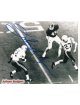 Johnny Rodgers signed Nebraska Cornhuskers B&W 8x10 Photo ( Heisman) (blue sig)